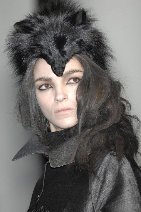Lip, Hairstyle, Black hair, Costume accessory, Costume, Fashion, Wig, Fur, Animal product, Fur clothing, 