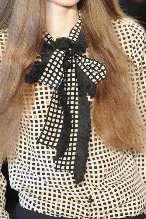 Brown, Textile, Pattern, Style, Fashion, Costume accessory, Black, Long hair, Beige, Brown hair, 