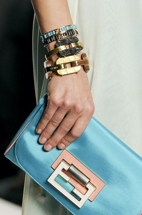 Finger, Wrist, Joint, Fashion accessory, Fashion, Teal, Electric blue, Nail, Metal, Bag, 