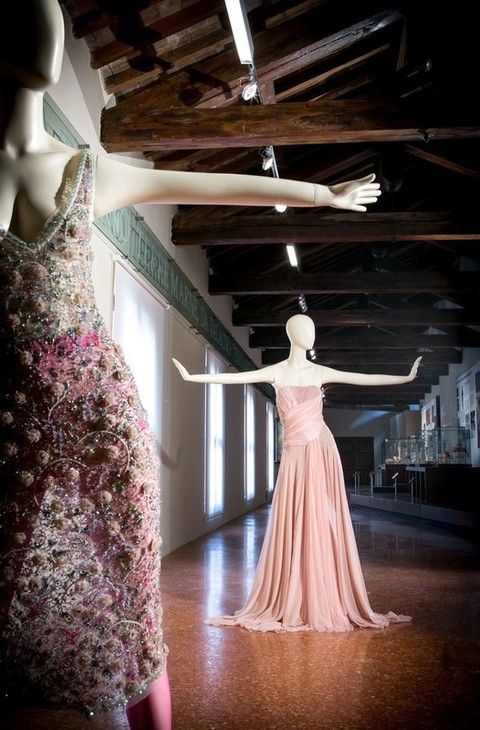 Lighting, Ceiling, Dress, Ceiling fan, Light fixture, One-piece garment, Waist, Gown, Mannequin, Sculpture, 