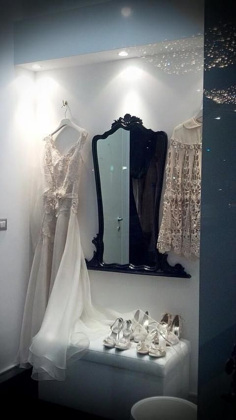 Dress, Mannequin, Retail, One-piece garment, Collection, Fashion design, Display case, Boutique, Silver, Display window, 