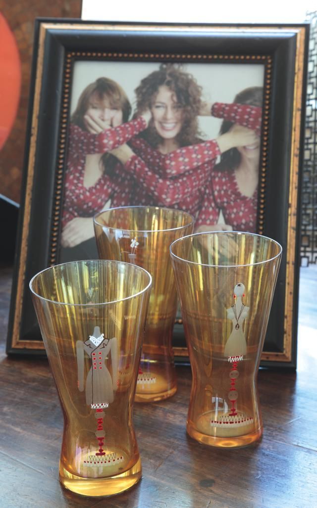 Drinkware, Barware, Picture frame, Glass, Interior design, Tooth, Beer glass, Tumbler, Highball glass, Pint glass, 