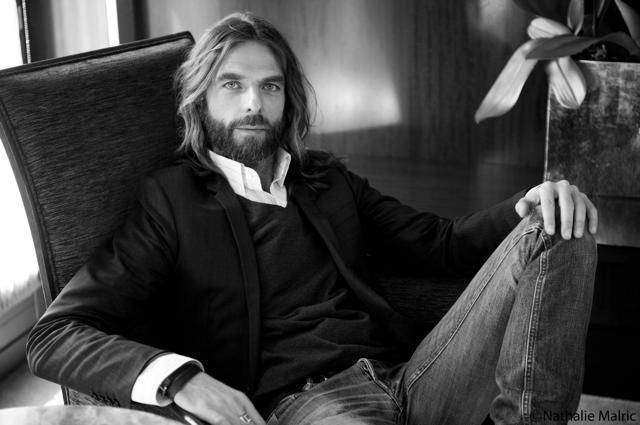 Facial hair, Textile, Denim, Sitting, Jeans, Moustache, Beard, Comfort, Monochrome, Portrait photography, 