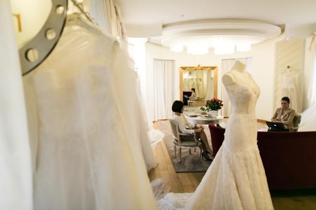 Dress, Room, Interior design, Textile, Photograph, Bridal clothing, Floor, Gown, Wedding dress, Ceiling, 