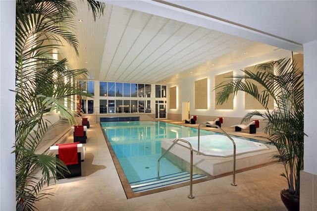 Swimming pool, Property, Resort, Interior design, Ceiling, Real estate, Chair, Tile, Composite material, Design, 