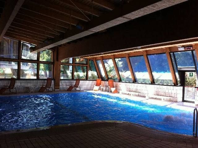 Swimming pool, Fluid, Property, Ceiling, Real estate, Resort, Shade, Beam, Leisure centre, Hotel, 