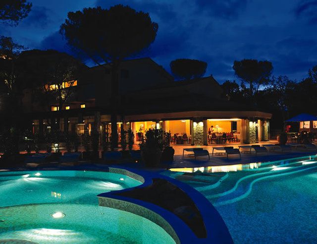 Swimming pool, Resort, Real estate, Aqua, Resort town, Hotel, Midnight, Villa, Eco hotel, Landscape lighting, 
