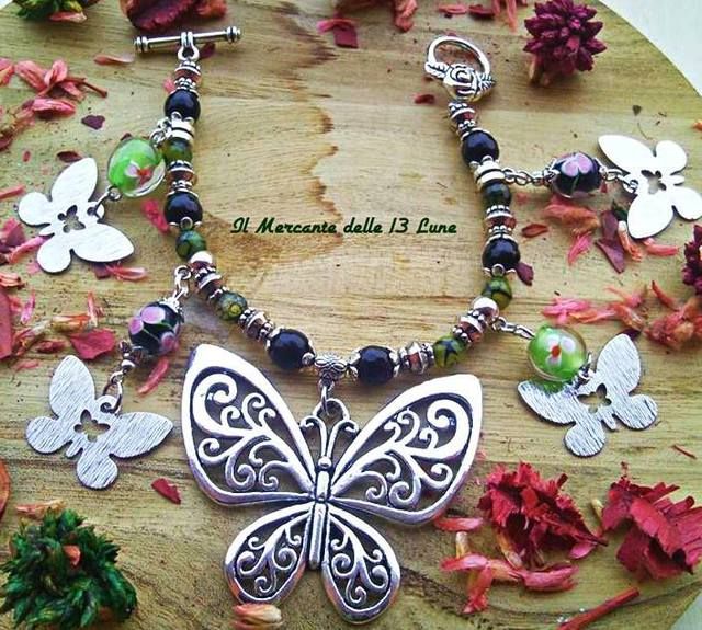 Pollinator, Insect, Arthropod, Wing, Fashion accessory, Petal, Body jewelry, Butterfly, Natural material, Invertebrate, 