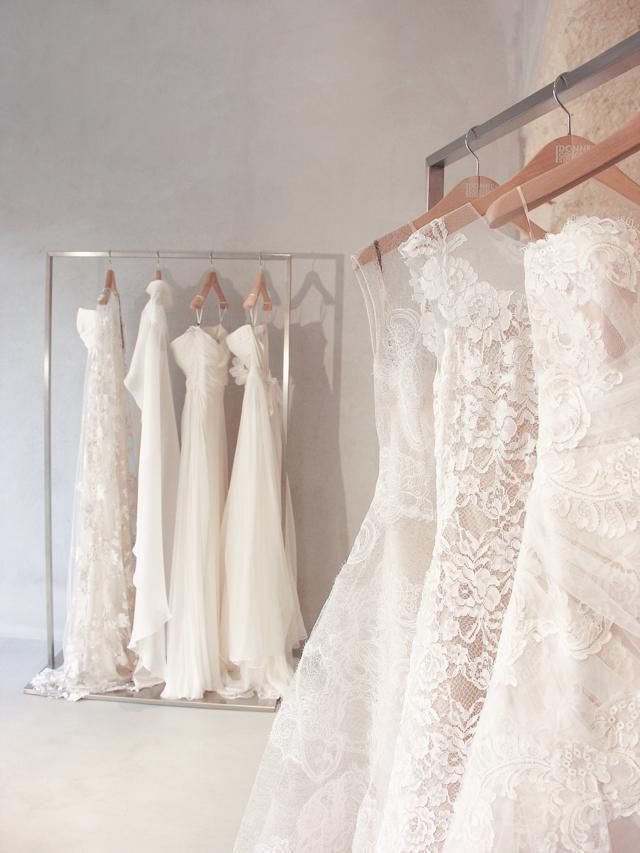 Textile, White, Clothes hanger, Wedding dress, Ivory, Embellishment, Lace, One-piece garment, Day dress, Fashion design, 