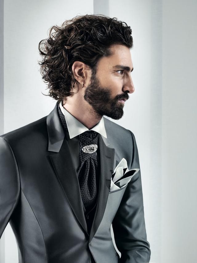 Clothing, Facial hair, Coat, Dress shirt, Hairstyle, Collar, Sleeve, Outerwear, Formal wear, Suit, 