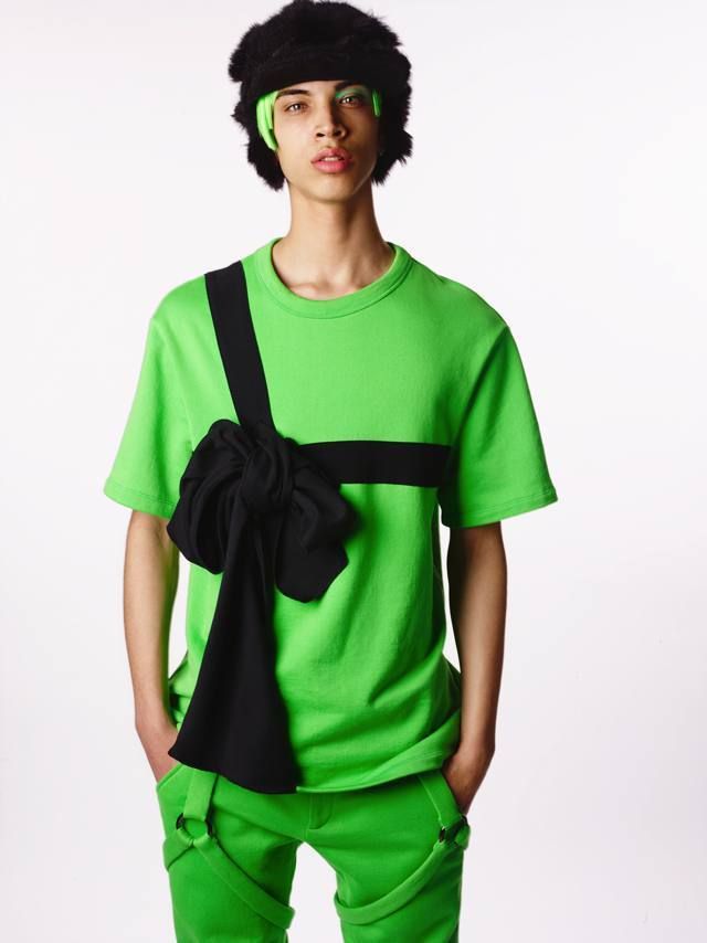 Green, Sleeve, Shoulder, Standing, Joint, Elbow, Fashion, Black hair, Costume accessory, Active shirt, 