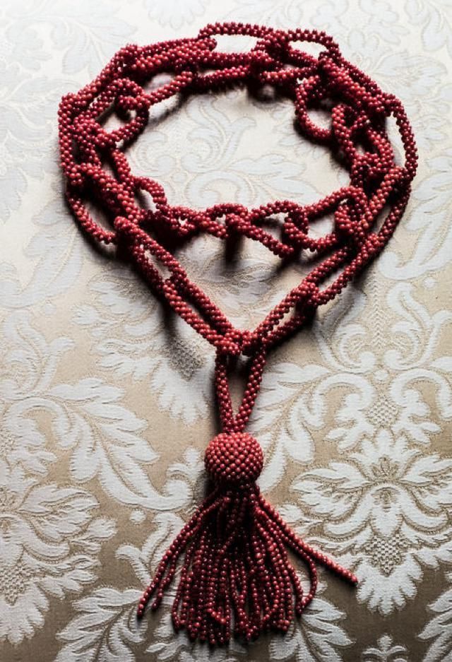 Pattern, Textile, Red, Fashion accessory, Natural material, Body jewelry, Maroon, Craft, Design, Chain, 
