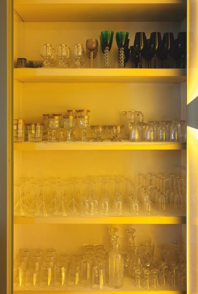 Yellow, Shelving, Shelf, Display case, Glass, Collection, Bottle, Glass bottle, Transparent material, 