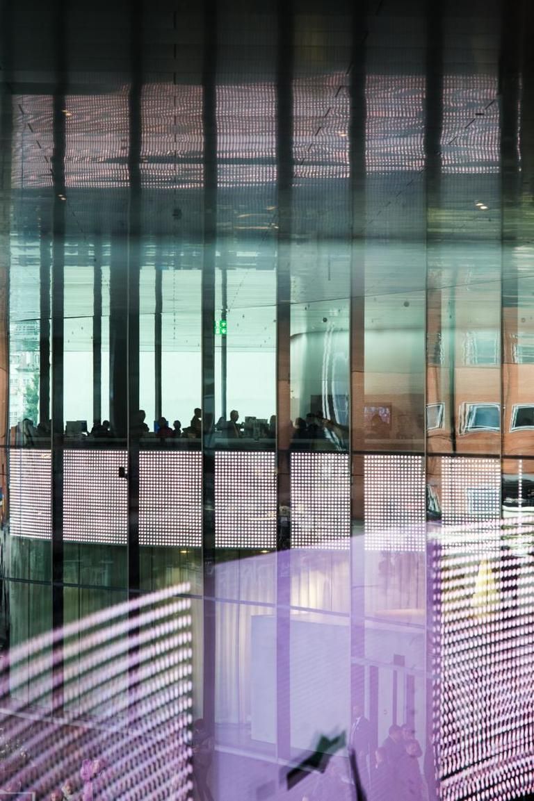 Glass, Purple, Fixture, Transparent material, Tints and shades, Iron, Commercial building, Mesh, Shadow, Building material, 