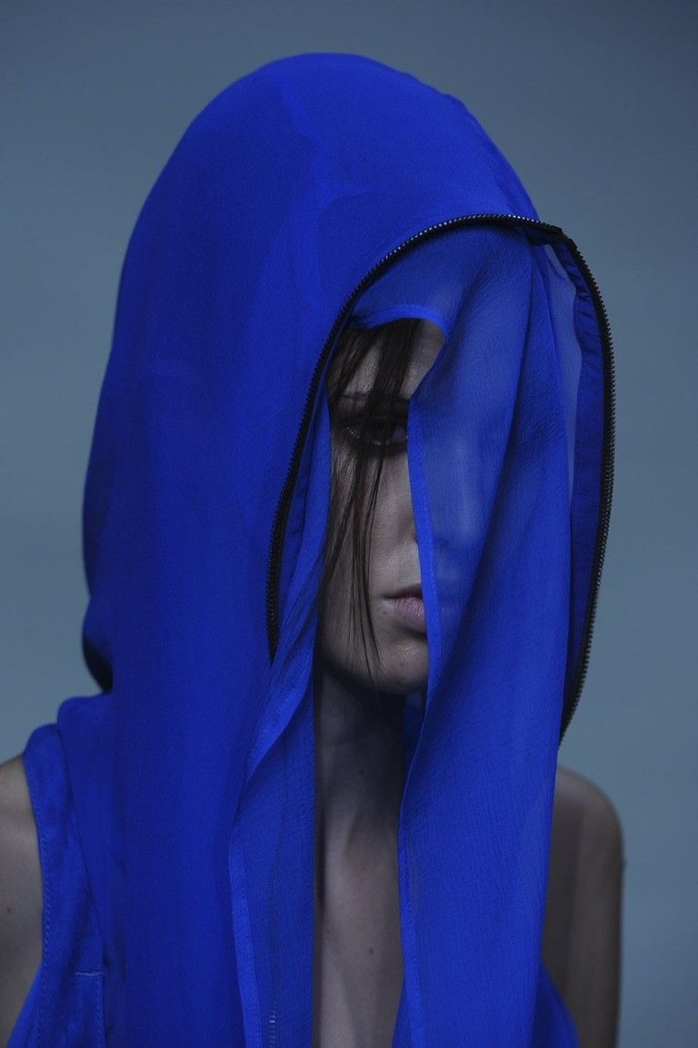 Blue, Lip, Electric blue, Cobalt blue, Neck, Azure, Costume accessory, Wrap, Hood, Costume, 