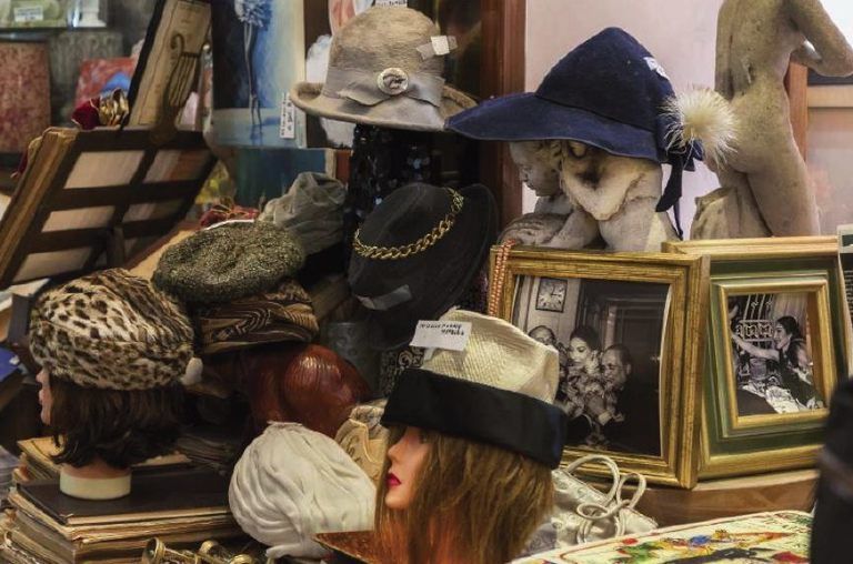 Hat, Headgear, Costume accessory, Fur, Sun hat, Collection, Costume hat, Fedora, Picture frame, Sculpture, 