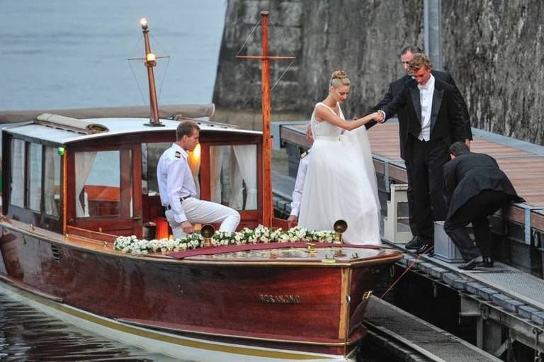 Dress, Watercraft, Suit, Boat, Coat, Formal wear, Naval architecture, Bride, Boating, Bridal clothing, 