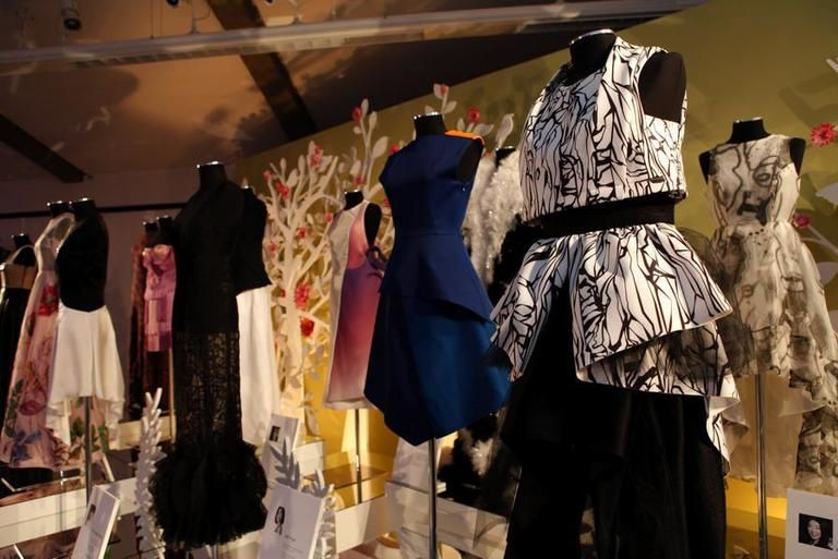 Retail, Textile, Dress, Mannequin, Clothes hanger, Fashion, One-piece garment, Costume design, Boutique, Collection, 