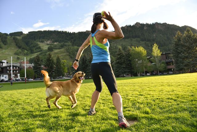 Dog, Carnivore, Dog breed, Leisure, People in nature, Active pants, Sporting Group, Sleeveless shirt, Companion dog, Fawn, 