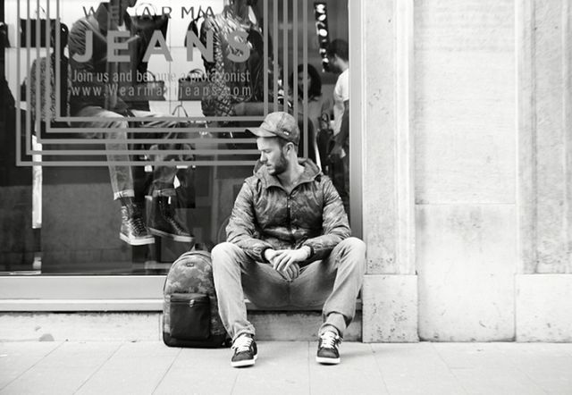 Monochrome, White, Sitting, Hat, Street, Monochrome photography, Style, Black-and-white, Luggage and bags, Street fashion, 