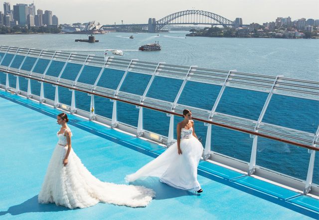 Water, Dress, Tied-arch bridge, Aqua, Leisure, Waterway, Watercraft, Bridal clothing, Wedding dress, Teal, 