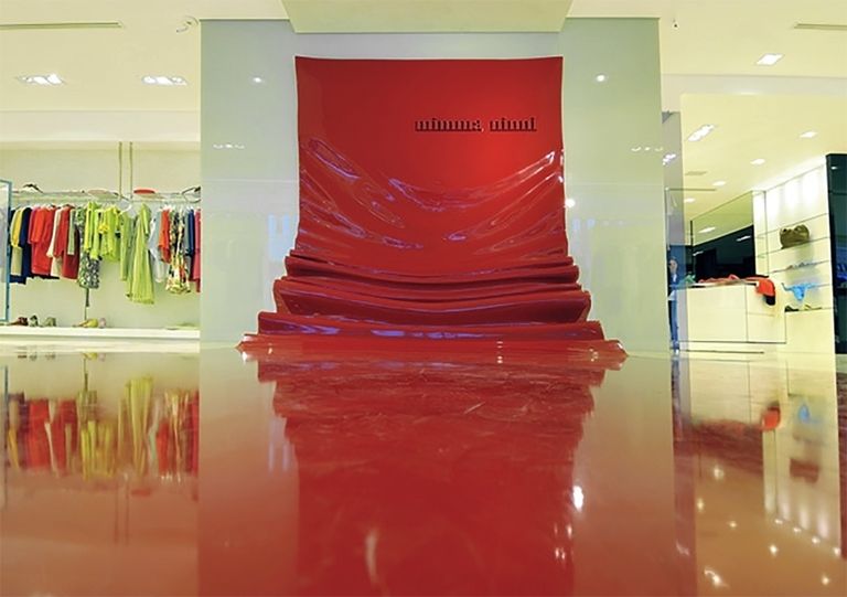 Red, Interior design, Amber, Floor, Ceiling, World, Reflection, Clothes hanger, Transparent material, Collection, 