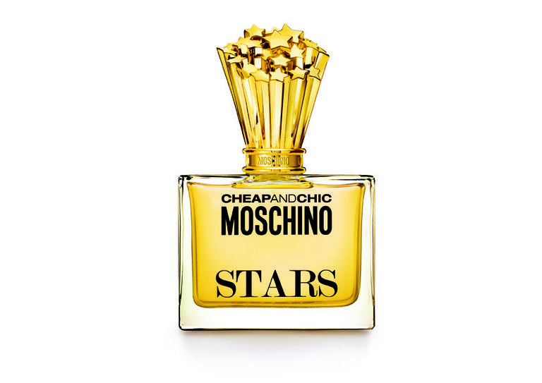 Yellow, Perfume, Bottle, Font, Trophy, Glass bottle, Brass, Cylinder, Distilled beverage, Label, 