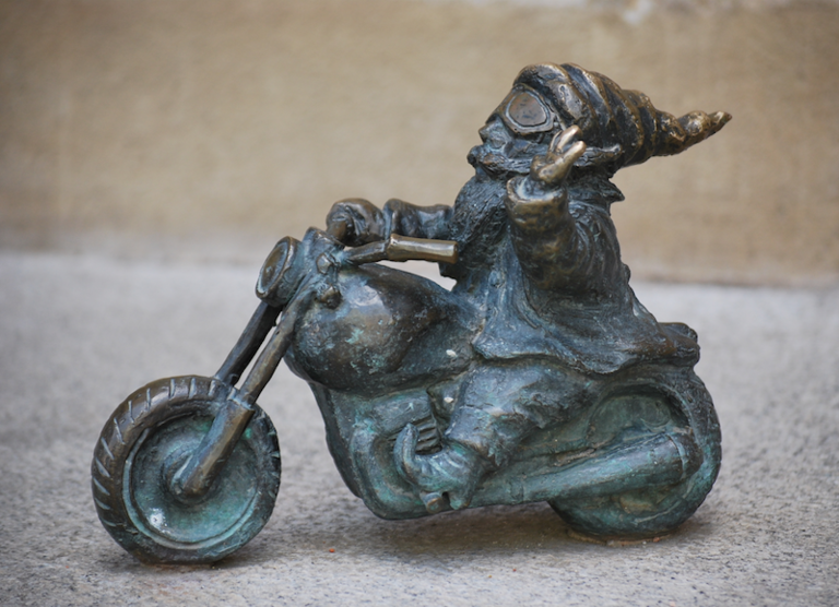 Sculpture, Bronze sculpture, Art, Working animal, Metal, Teal, Figurine, Statue, Pack animal, Motorcycle, 