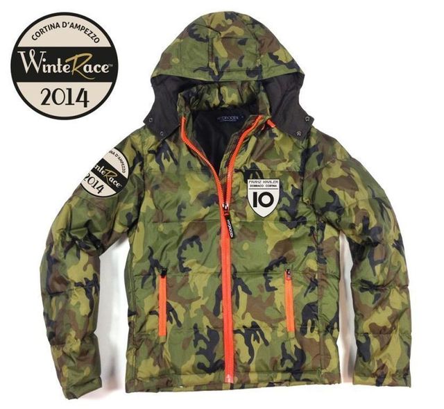 Clothing, Sleeve, Collar, Camouflage, Pattern, Outerwear, Uniform, Military camouflage, Logo, Hood, 