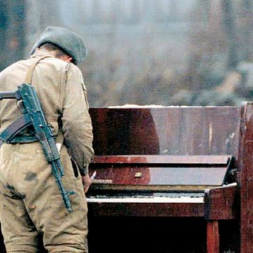 Cap, Winter, Keyboard, Piano, Bench, Boot, Beret, Military person, Soldier, Law enforcement, 