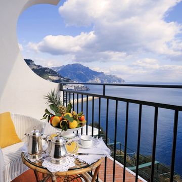Table, Furniture, Chair, Horizon, Outdoor furniture, Home, Balcony, Ocean, Outdoor table, Linens, 