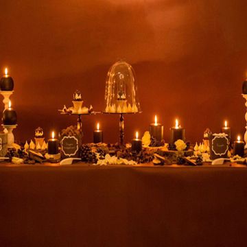 Lighting, Amber, Tablecloth, Candle, Lighting accessory, Home accessories, Electricity, Candle holder, Linens, Stemware, 