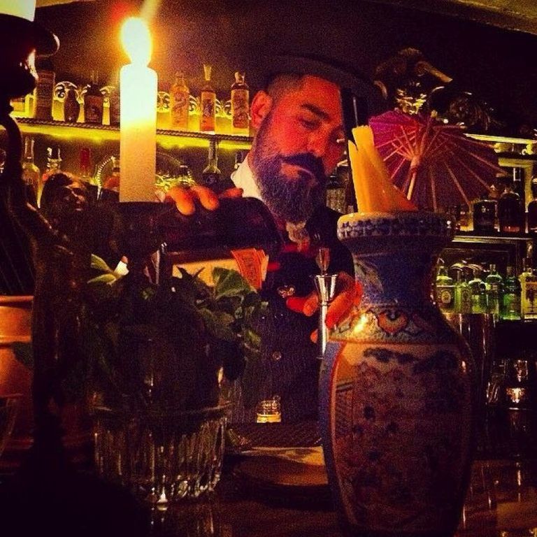Beard, Barware, Facial hair, Incense, Joss stick, Candle holder, Candle, Moustache, Pottery, Vase, 