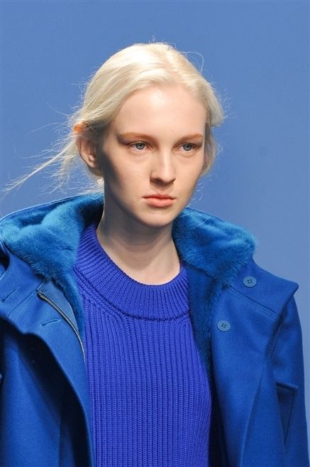 Clothing, Blue, Lip, Hairstyle, Sleeve, Jacket, Eyebrow, Textile, Outerwear, Collar, 