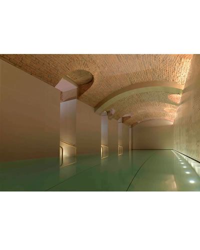 Ceiling, Amber, Wall, Floor, Tunnel, Light fixture, Symmetry, 