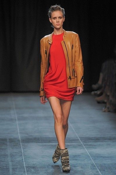 Clothing, Brown, Human leg, Shoulder, Fashion show, Joint, Outerwear, Runway, Style, Fashion accessory, 