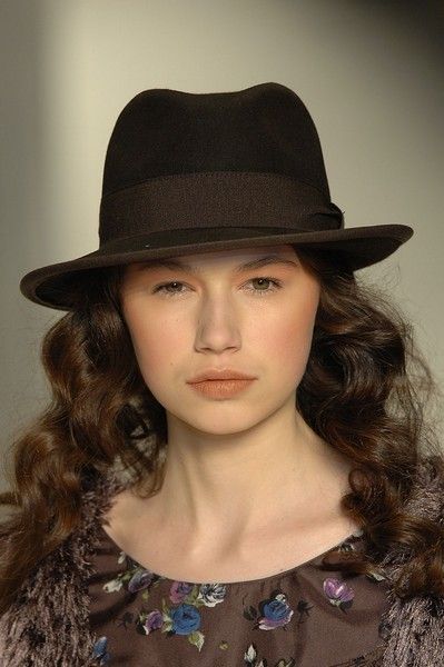 Lip, Brown, Hat, Hairstyle, Chin, Style, Fashion accessory, Headgear, Costume accessory, Beauty, 