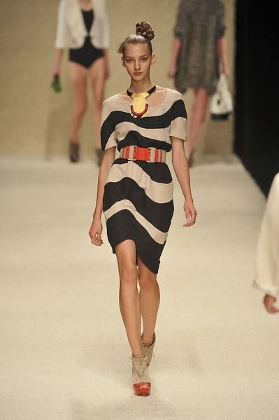 Clothing, Fashion show, Human leg, Shoulder, Dress, Runway, Joint, Fashion model, Waist, Style, 