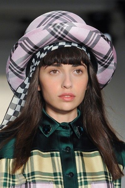 Clothing, Lip, Textile, Pattern, Headgear, Costume accessory, Fashion, Street fashion, Costume, Plaid, 