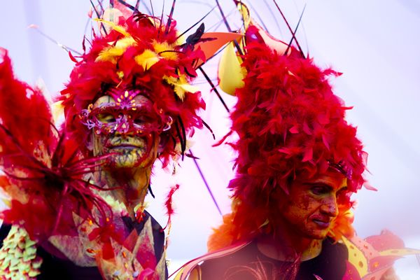 Mouth, Red, Colorfulness, Magenta, Headgear, Costume, Carnival, Costume accessory, Festival, Tradition, 