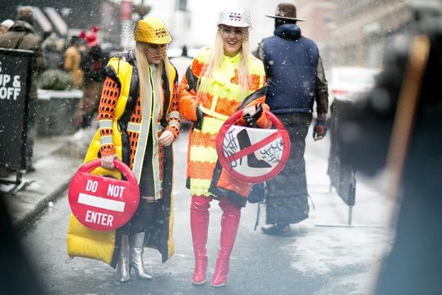Winter, Personal protective equipment, Bag, Helmet, Workwear, Interaction, High-visibility clothing, Luggage and bags, Hard hat, Street fashion, 