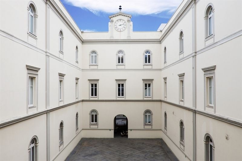 Window, Facade, Door, Palace, Symmetry, Classical architecture, Courtyard, Medieval architecture, Clock, Molding, 
