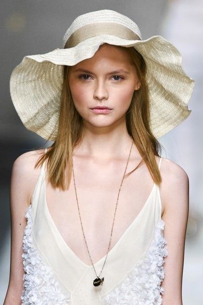 Clothing, Hat, Lip, Skin, Shoulder, White, Summer, Fashion accessory, Beauty, Sun hat, 