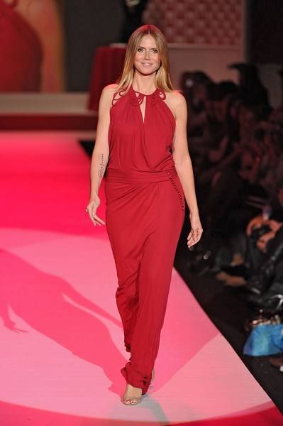 Lip, Shoulder, Fashion show, Red, Joint, Runway, Style, Dress, Fashion model, High heels, 