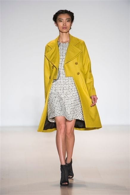 Clothing, Footwear, Yellow, Sleeve, Fashion show, Shoulder, Joint, Outerwear, Fashion model, Runway, 