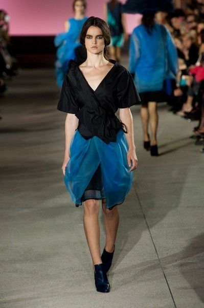 Clothing, Blue, Fashion show, Event, Shoulder, Hat, Human leg, Joint, Outerwear, Runway, 