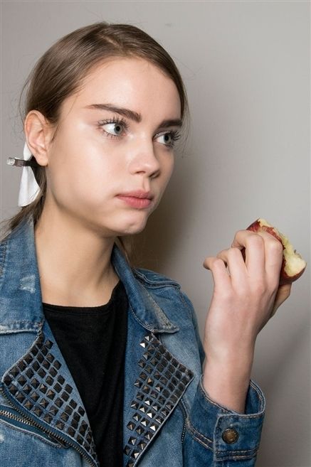 Lip, Brown, Hairstyle, Denim, Jacket, Collar, Textile, Outerwear, Style, Earrings, 