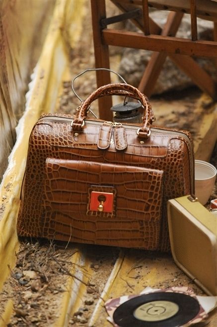 Brown, Bag, Iron, Metal, Luggage and bags, Shoulder bag, Baggage, Building material, Picnic basket, Leather, 
