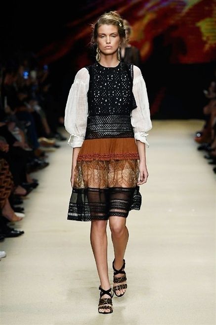 Clothing, Footwear, Brown, Fashion show, Shoulder, Human leg, Joint, Runway, Outerwear, Style, 
