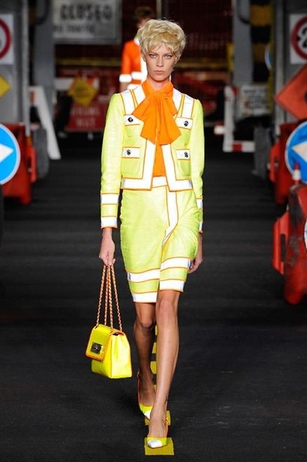 Yellow, Style, Street fashion, Bag, Fashion, Logo, Luggage and bags, Signage, Shoulder bag, Traffic sign, 